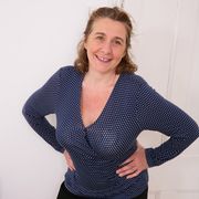 Naughty British housewife showing off her big tits